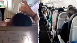 Passenger's bizarre use of drinking glass on flight leaves travelers horrified Education Guide